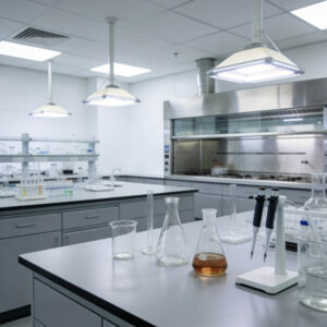 It's a analytical lab. Some glass bottles are on a table