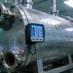 Why Vacuum Gauge Readings Oscillate During Gas Backfill