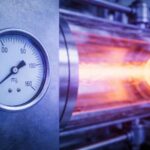 Vacuum Gauge Sensitivity to Electromagnetic Fields in Sputtering Systems