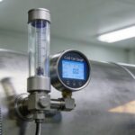 Understanding Vacuum Gauge Noise Floor at Ultra-Low Pressure